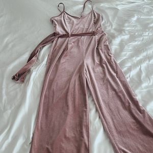 Pink velvet jumpsuit with belt